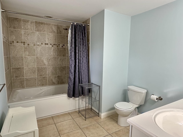 full bath featuring toilet, tile patterned floors, shower / bath combination with curtain, and a sink