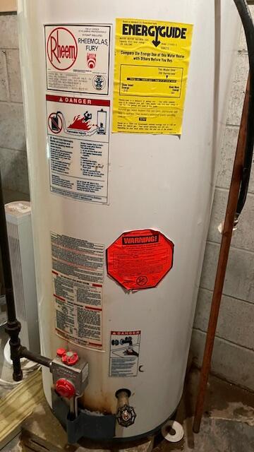 utility room with water heater