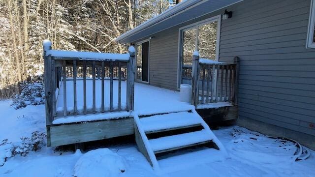 view of snow covered deck