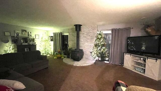 carpeted living area featuring a wood stove