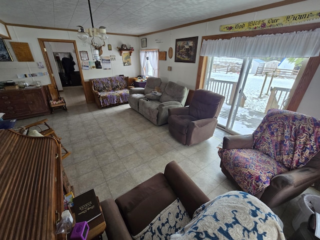 living area with ornamental molding