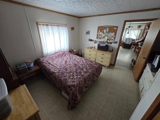 bedroom featuring crown molding