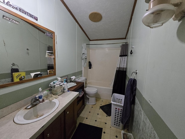 bathroom with toilet, shower / bath combo with shower curtain, ornamental molding, tile patterned floors, and a textured ceiling