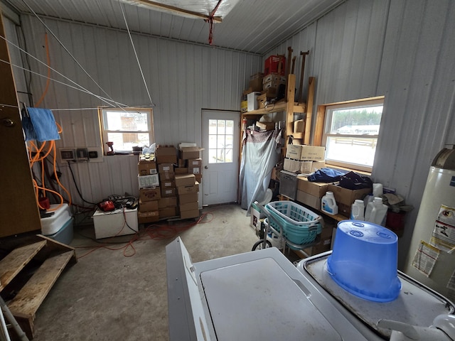 garage with metal wall and water heater