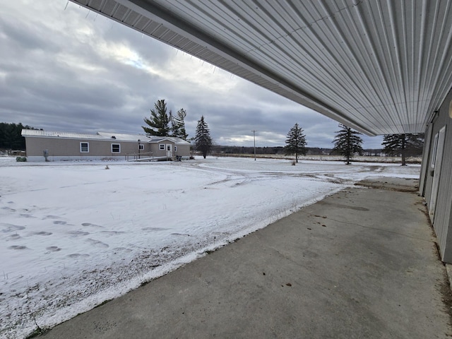 view of yard covered in snow