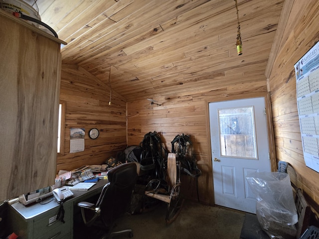 interior space with lofted ceiling, wooden ceiling, and wood walls