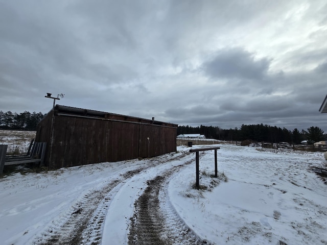 view of road with an outbuilding