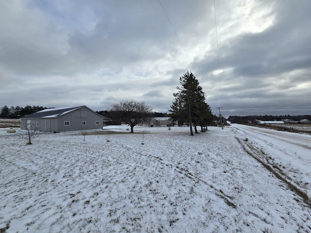 view of yard layered in snow