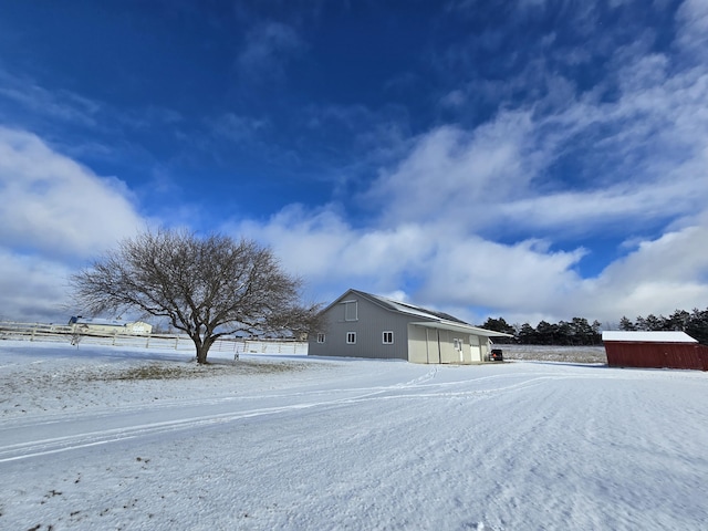 view of snow covered property