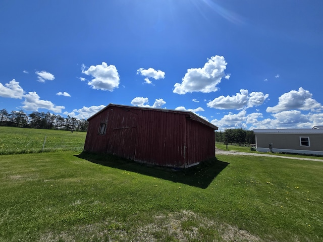 440 N Galbraith Rd, Mio, MI 48647 - view of pole building with a yard