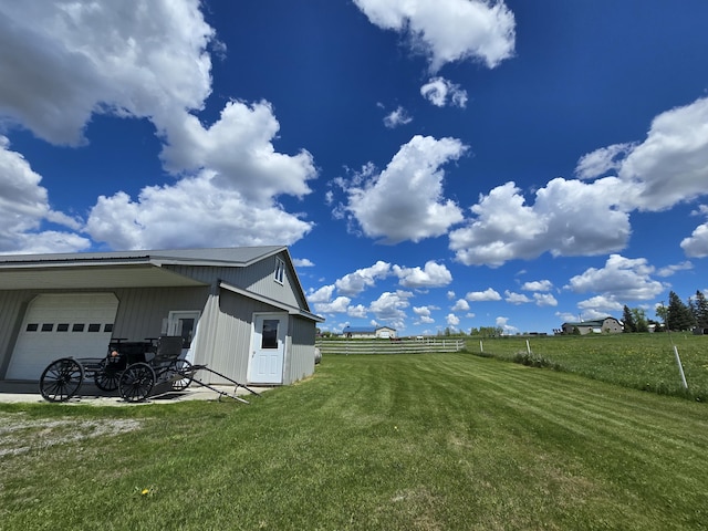 440 N Galbraith Rd, Mio, MI 48647 - view of yard featuring an attached garage and a view of rural / pastoral area