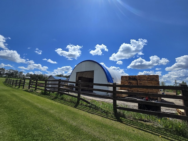440 N Galbraith Rd, Mio, MI 48647 - view of yard featuring an outbuilding and a garage