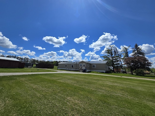 440 N Galbraith Rd, Mio, MI 48647 - view of front facade featuring a front lawn