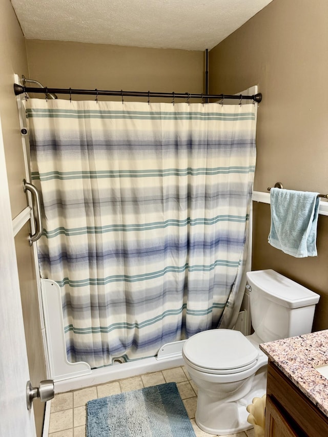 bathroom with tile patterned floors, vanity, and a shower with shower curtain