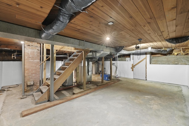 unfinished below grade area featuring stairway and wood ceiling