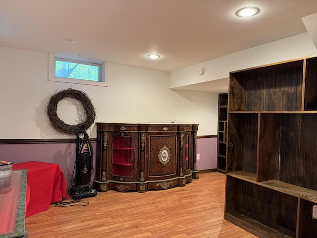 interior space with recessed lighting and wood finished floors