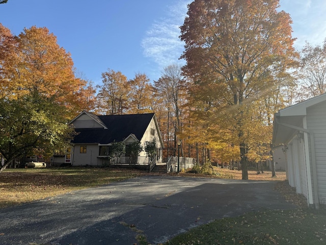 view of home's exterior featuring driveway