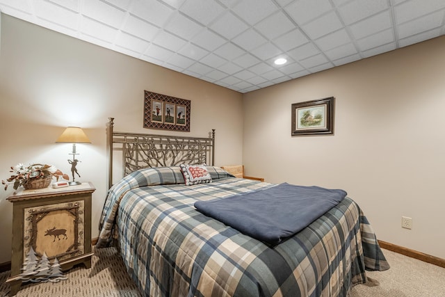 bedroom with recessed lighting, carpet, a paneled ceiling, and baseboards