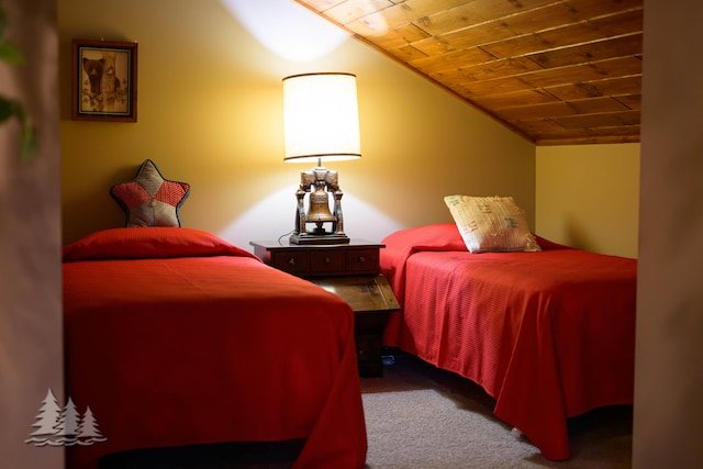 carpeted bedroom featuring wooden ceiling and vaulted ceiling