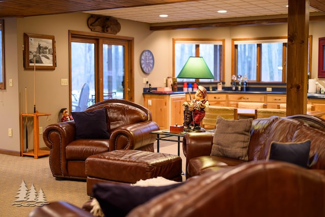 carpeted living room featuring recessed lighting and baseboards