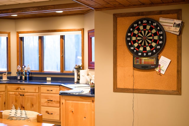 bathroom featuring beamed ceiling and wood ceiling