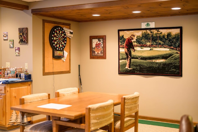 dining area with recessed lighting, baseboards, indoor bar, and wooden ceiling