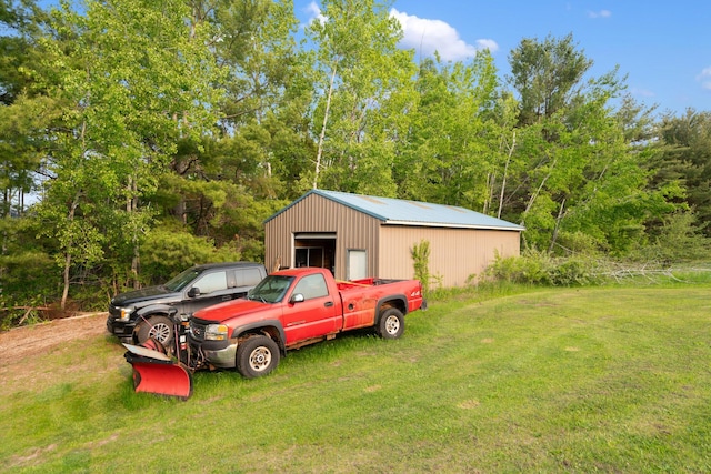 6626 Varonica Ln, Cheboygan, MI 49721 - exterior space with an outdoor structure, an outbuilding, and a detached garage