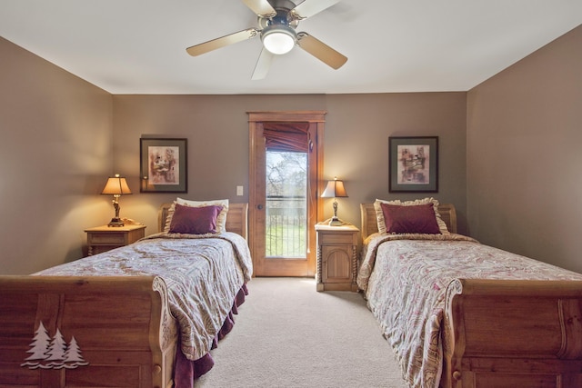 bedroom with ceiling fan, access to outside, and light carpet