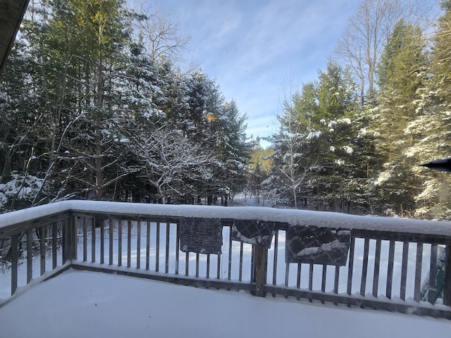 view of snow covered deck