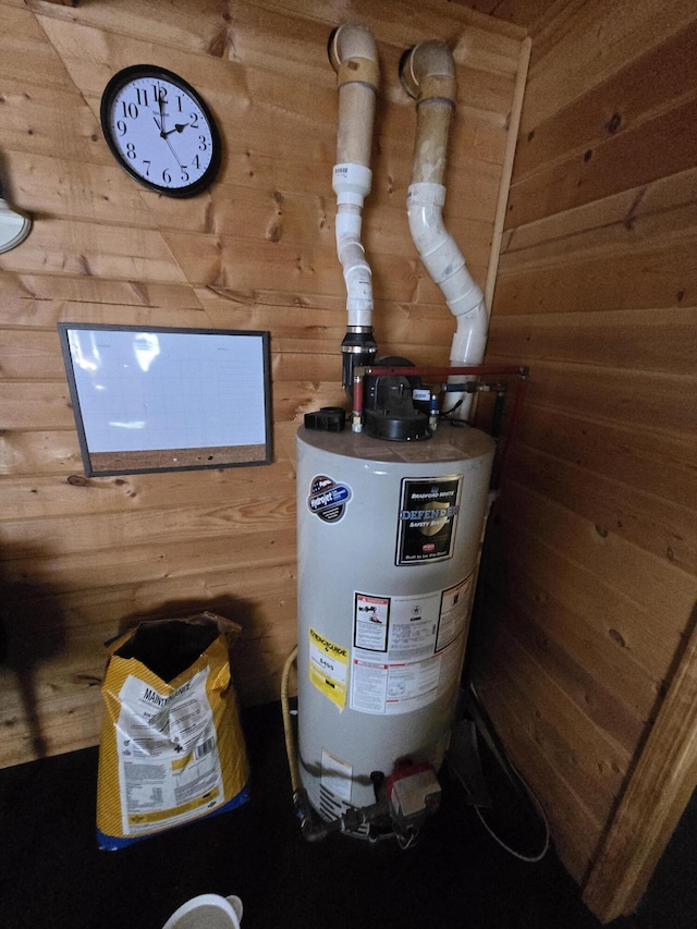 utility room with water heater