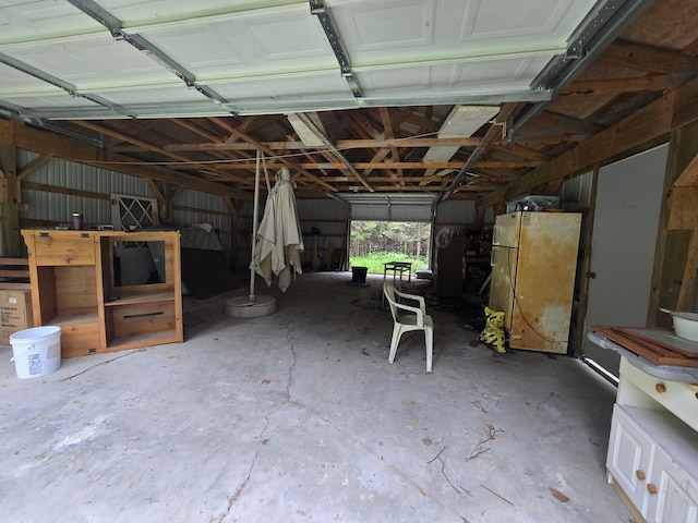2709 Timberlane Trl, Grayling, MI 49738 - garage with freestanding refrigerator