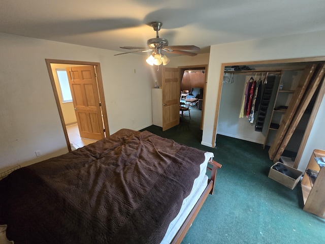 2709 Timberlane Trl, Grayling, MI 49738 - bedroom with carpet, a ceiling fan, and a closet
