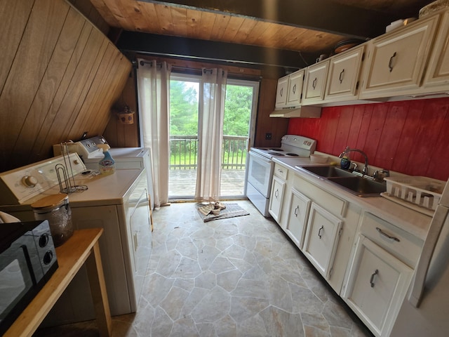 2709 Timberlane Trl, Grayling, MI 49738 - kitchen featuring white range with electric stovetop, stone flooring, wooden walls, light countertops, and under cabinet range hood