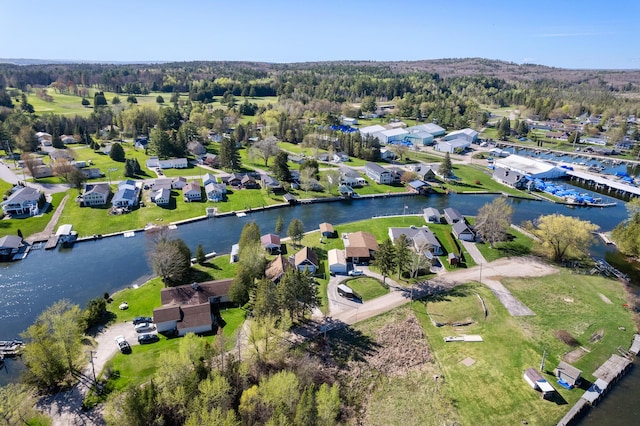 bird's eye view with a residential view and a water view