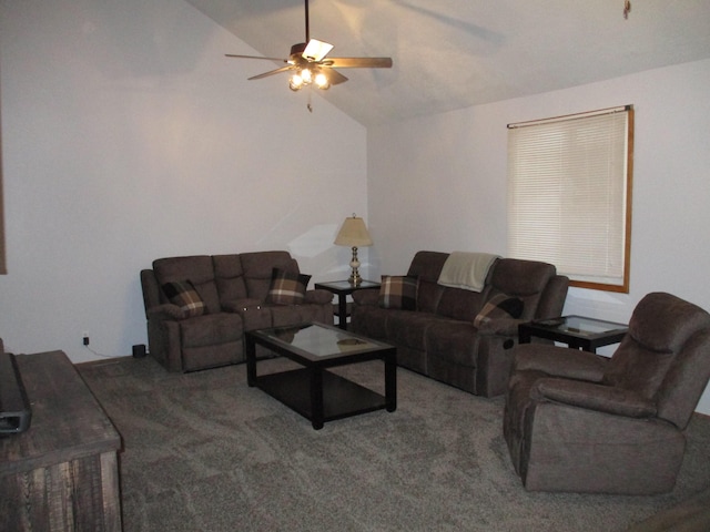 carpeted living area featuring a ceiling fan and vaulted ceiling