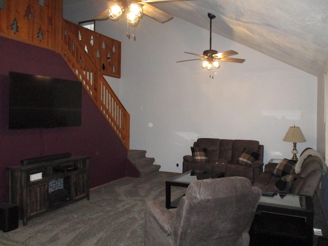 carpeted living room with lofted ceiling, a ceiling fan, and stairs