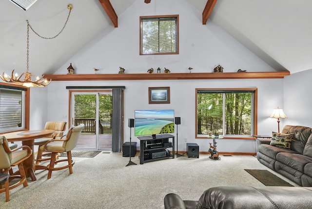 carpeted living room featuring baseboards, visible vents, high vaulted ceiling, beamed ceiling, and a chandelier