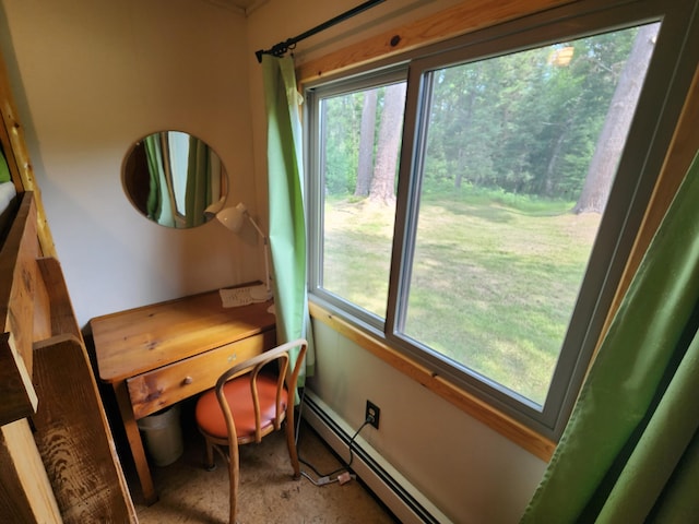 office space with a baseboard radiator