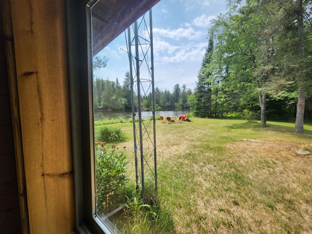 view of yard with a water view