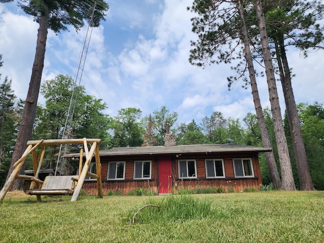 view of front of property with a chimney