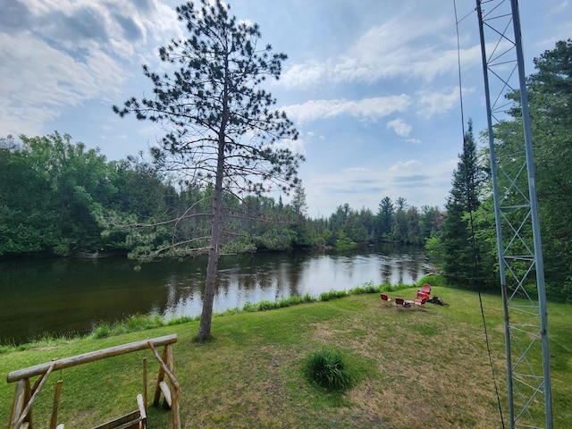 view of water feature featuring a forest view