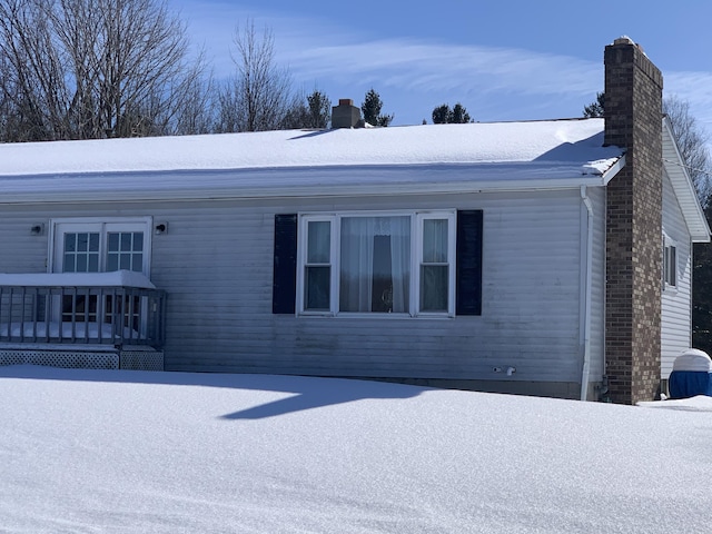 view of front of house with a chimney