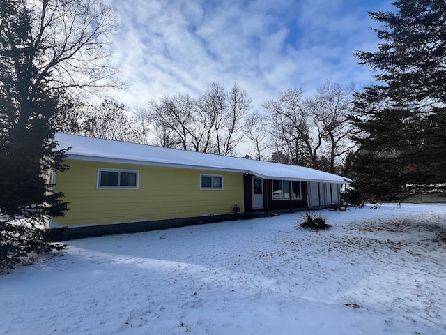 single story home featuring a carport