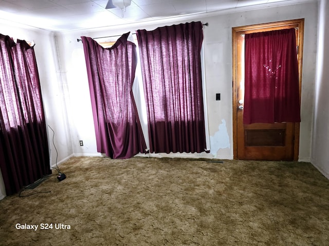 interior space with crown molding