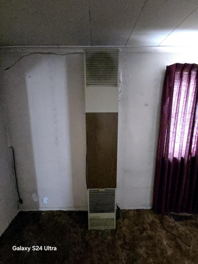 spare room featuring a heating unit