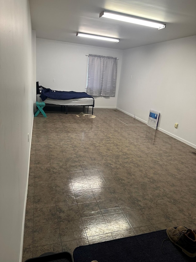 bedroom with baseboards