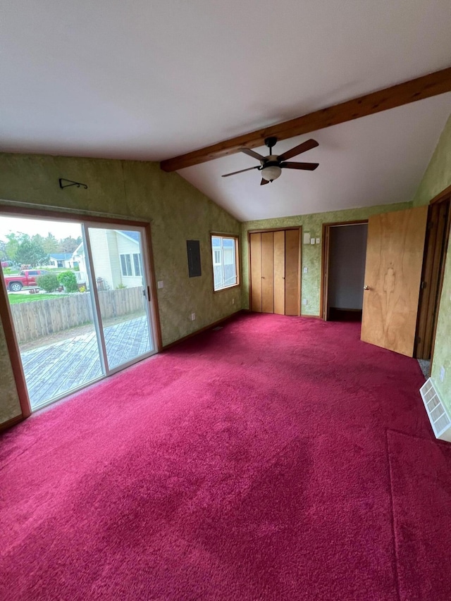 unfurnished living room with visible vents, carpet floors, lofted ceiling with beams, electric panel, and ceiling fan