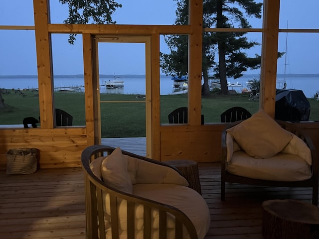 sunroom with a water view