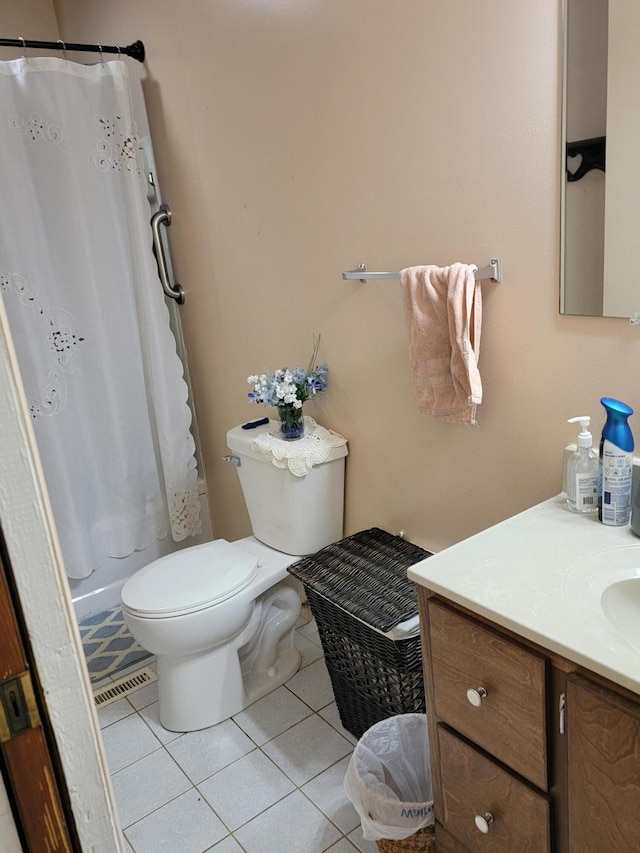 bathroom featuring vanity, visible vents, curtained shower, tile patterned floors, and toilet