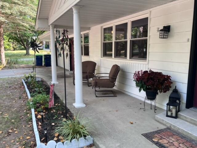 view of patio featuring a porch